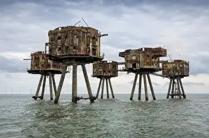 The towers of the Red Sands Fort - part of the decommissioned Maunsell Forts, the armed towers built in the Thames estuary to protect the Kent coast during the Second World War, near Whitstable, Kent, England