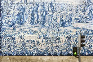 Iberian Prints: Traditional azulejos hand-painted tiles covering the exterior wall of the Igreja dos