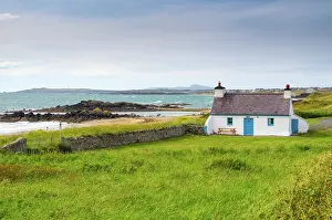 Anglesey Prints: Traditional cottage in Anglesey, Wales