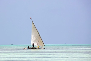 Nungwi Prints: Traditional dhow heading out to sea on a fishing trip, Nungwi, Zanzibar, Tanzania