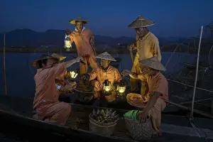 Hats Prints: Traditional fishermen on Lake Inle having a supper on boats together at night, Lake Inle