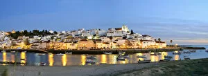 Images Dated 12th February 2018: The traditional fishing village of Ferragudo at dusk, bordering the Arade river. Algarve