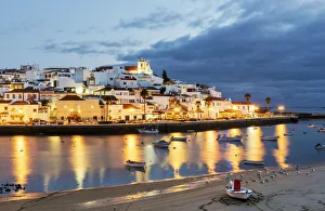 Images Dated 3rd April 2017: The traditional fishing village of Ferragudo at dusk. Algarve, Portugal
