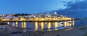 Images Dated 3rd April 2017: The traditional fishing village of Ferragudo at dusk. Algarve, Portugal