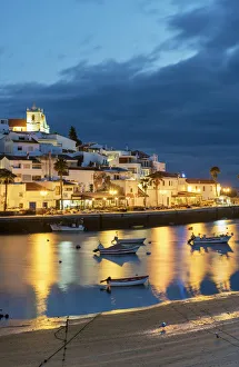 Images Dated 3rd April 2017: The traditional fishing village of Ferragudo at dusk. Algarve, Portugal