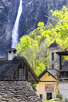 Val Bavona Prints: Traditional houses and church of Foroglio with the waterfall in the background, Val