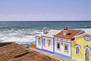 Copyspace Prints: Traditional houses facing the Atlantic Ocean. Ericeira, Portugal