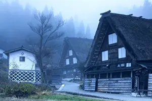 Traditional houses of Ogimachi (UNESCO World Heritage Site) in mist, Shirakawa-go