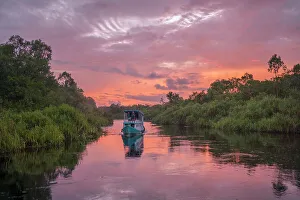 Images Dated 28th February 2023: Traditional Klotok with tourists on the Sekonyer River, Tanjung Puting National Park, Kalimantan