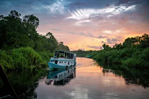 Images Dated 28th February 2023: Traditional Klotok with tourists on the Sekonyer River, Tanjung Puting National Park, Kalimantan