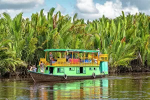 Images Dated 28th February 2023: Traditional Klotok with tourists on the Sekonyer River, Tanjung Puting National Park, Kalimantan