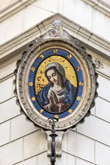Traditional Madonnella or Madonna mosaic placed in a buildings corner, Rome, Lazio