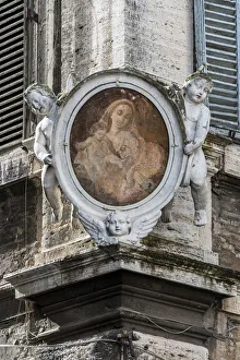 Traditional Madonnella or Madonna painting placed in a buildingaAAs corner, Rome, Lazio Traditional Madonnella or Madonna painting placed in a buildingaAAs corner, Rome, Lazio