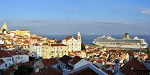 Belvedere Prints: The traditional and moorish Alfama district and a cruise ship on the Tagus river. Lisbon