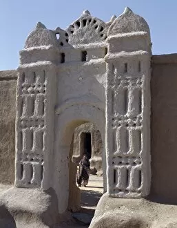 Islamic Dress Gallery: Traditional Nubian architecture at a gate in the village