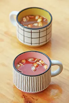 Appetizer Prints: A traditional Peruvian fish soup dish with corn served at Boris - Alma de la Cocina'restaurant