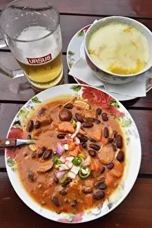 Dinner Prints: Traditional pork goulash prepared with hot sausages and red beans and traditional