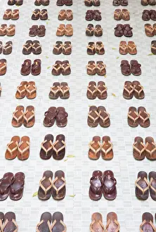 Sandals Prints: Traditional sandals arranged in neat rows outside a nunnery, Myanmar, (Burma), Asia