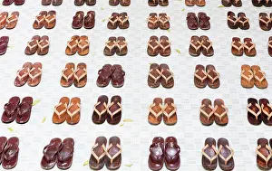Sandals Prints: Traditional sandals arranged in neat rows outside a nunnery, Myanmar, (Burma), Asia