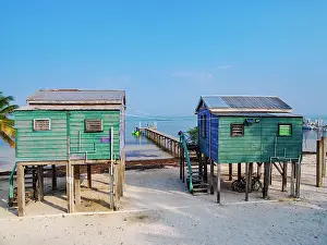 Stilt Prints: Traditional stilt houses at the waterfront of Caye Caulker, Belize District, Belize