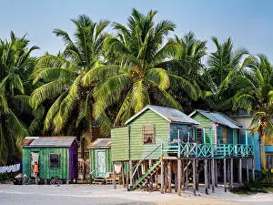 Stilt Prints: Traditional stilt houses at the waterfront of Caye Caulker, Belize District, Belize