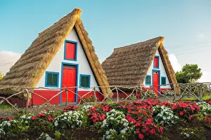 Saint Anne Prints: Traditional thatch house with flowers, Santana, Madeira, Portugal