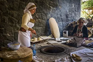 Images Dated 19th June 2017: Traditional way of baking bread in the tandoor. Armenia