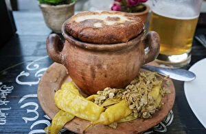 Traditional way to eat Lobio (stewed beans) in a ceramic pot. Georgian traditional food