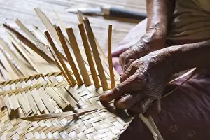 Traditional Weaving inside Longhouse (Communal House), Sarawak, Malaysian Borneo