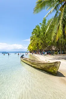 Starfish Prints: Traditional wooden boat. Playa Estrella (Starfish beach), Colon island