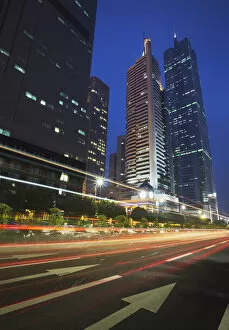 Images Dated 5th July 2010: Traffic passing in front of CITIC Plaza, Guangzhou, Guangdong Province, China