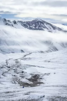 Images Dated 12th September 2019: Trail leading through snow covered valley during winter to Rainbow Mountain, Uchullujllo
