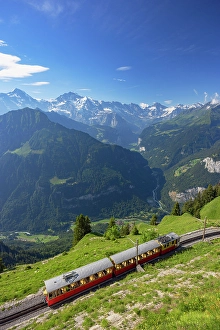 Train Prints: Train of cogwheel railway with Jungfrau and Monch mountains