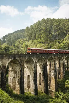 Images Dated 31st December 2018: Train crossing Nine Arch Bridge, Ella, Uva Province, Sri Lanka, Asia