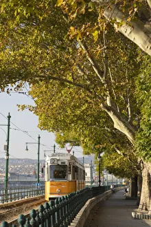 East European Prints: Tram passing along Danube Promenade, Budapest, Hungary