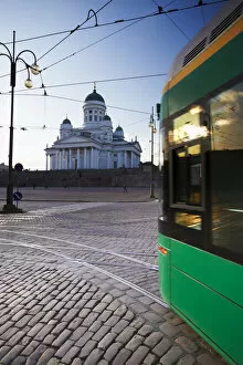 Images Dated 17th February 2010: Tram passing in front of Lutheran Cathedral in Senate Square, Helsinki, Finland