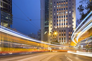 Trams passing Bank of China Building and HSBC Building, Central, Hong Kong, China