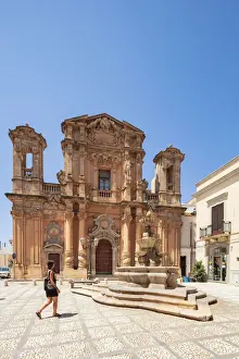Marsala Prints: Trapani, Sicily. A woman walking in front of Purgatory Church in Marsala town center