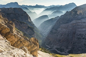 Travenanzes Valley with early morning mist, Cortina d'Ampezzo, Belluno district Travenanzes Valley with early morning mist, Cortina d'Ampezzo, Belluno district