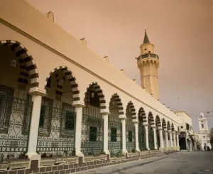 Tripoli, Libya; The Ahmed Pasha Qaramanli Mosque standing right behind one of the main Tripoli, Libya; The Ahmed Pasha Qaramanli Mosque standing right behind one of the main