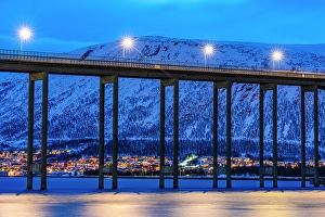 Street Light Prints: Tromso bridge reflected in the frozen sea at blue hour, Troms og Finnmark, Norway
