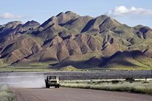 Dust Gallery: A truck passing through the Naukluft Mountains near Solitaire