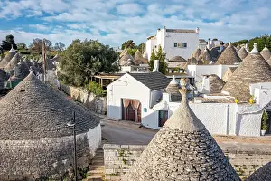 Bari Prints: Trulli di Alberobello, houses with the typical conical stone roofs. Puglia, Italy