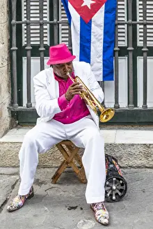 A trumpet player in Plaza de Armas, La Habana Vieja (Old Town), Havana, Cuba