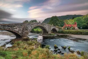 Tu Hwnt l r Bont Tearooms covered in Virginia creeper in autumn, Llanrwst, Conwy, Wales