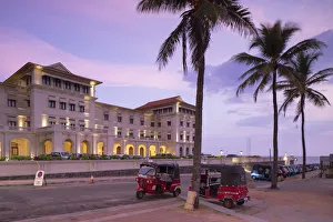 Images Dated 10th June 2019: Tuk tuks parked outside Galle Face Hotel at sunset, Colombo, Sri Lanka