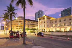 Images Dated 10th June 2019: Tuk tuks parked outside Galle Face Hotel at sunset, Colombo, Sri Lanka