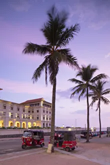 Images Dated 10th June 2019: Tuk tuks parked outside Galle Face Hotel at sunset, Colombo, Sri Lanka