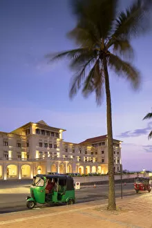 Images Dated 10th June 2019: Tuk tuks parked outside Galle Face Hotel at sunset, Colombo, Sri Lanka