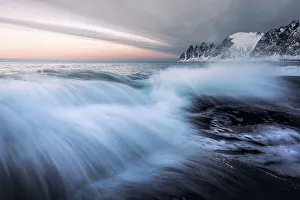 Tungeneset and the Okshornan Peaks during a winter sunrise, Senja Island, Norway